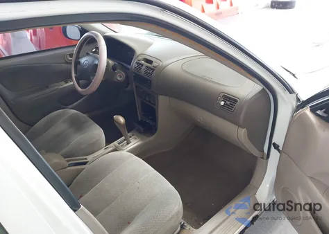 1999 Toyota Corolla Ce z USA, uszkodzony, nr VIN 2T1BR12E7XC192398